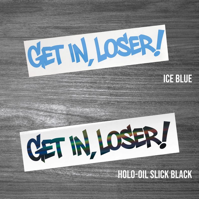 May include: Two rectangular vinyl decals featuring the text GET IN, LOSER! in a bold, jagged font. The top decal is ice blue, and the bottom decal is a holographic oil slick black finish. Both stickers are presented on a white background.