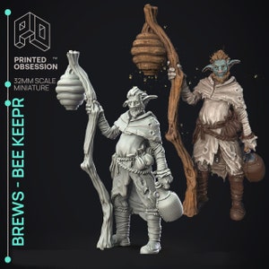 May include: Two 32mm scale miniature figures of fantasy beekeepers. One figure is a humanoid with pointed ears, wearing a hooded robe and holding a staff with a beehive. The other figure is a goblin-like creature with large ears, wearing a hooded robe and holding a staff with a beehive. The figures are painted in a light gray color.