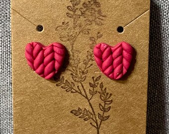 Dark pink knit heart studs