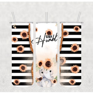 May include: Three stainless steel tumblers with lids and straws. The tumblers are decorated with a black and white striped pattern, sunflowers, and a watercolor elephant with the text "Stay Humble".