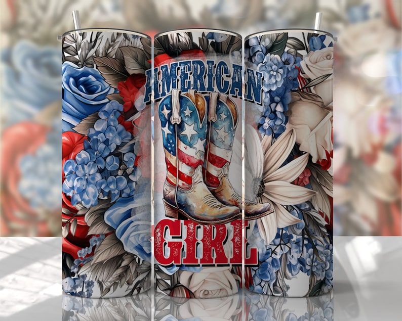 May include: A white tumbler with a floral design featuring blue and red flowers. The tumbler has the text "AMERICAN GIRL" with a pair of cowboy boots decorated with the American flag.