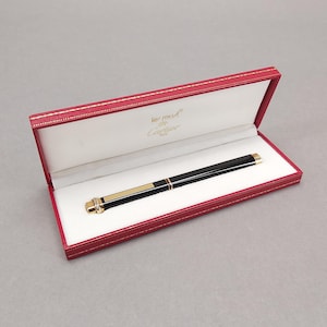 A "Les Must De" Cartier Vendome Trinity Black Laquer Fountain Pen.