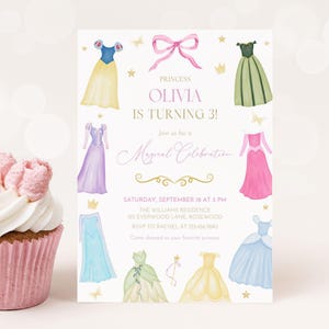 May include: A pink cupcake with white frosting sits next to a princess-themed invitation. The invitation features watercolor illustrations of princess dresses and the text "Princess Olivia is turning 3!" with event details.
