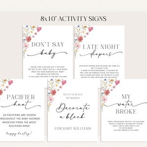 May include: Set of five 8x10 inch activity signs for a baby shower. Each sign features floral accents and playful text like "Don't Say Baby" and "Pacifier Hunt". The signs are designed to add fun to the event.