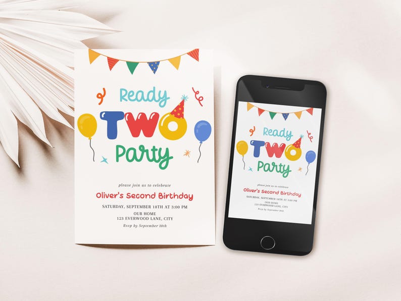 May include: A birthday invitation and a smartphone displaying the same design. The invitation reads "Ready TWO Party" with colorful balloons and a party hat. The invitation includes the text "Oliver's Second Birthday".