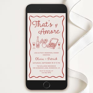 May include: A digital invitation for a rehearsal dinner with the text "That's Amore" in red cursive font. The invitation features a red wine bottle, a glass of wine, a pizza, and a vase of flowers. The text includes the names Olivia and Patrick, the date and time of the event, the location, and the RSVP information.