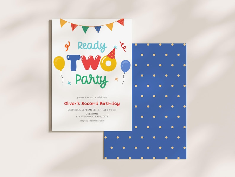 May include: A birthday party invitation with the words "Ready TWO Party" in colorful letters. The invitation includes the text "Oliver's Second Birthday" and event details. A blue card with yellow polka dots is next to the invitation.