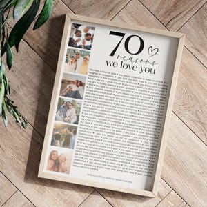 May include: A framed print with a white background and black text that reads "70 reasons we love you". The print features a heart symbol and several photos of people.