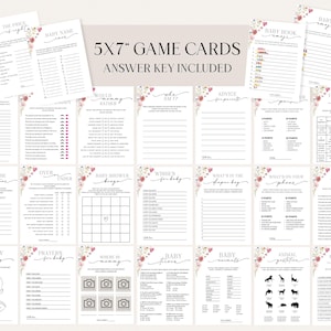 May include: A collection of 5x7 inch baby shower game cards with an answer key. The cards feature floral accents and various game prompts like "Baby Name," "Would Mommy Rather," and "Baby Bingo." The design is primarily white with pink and green floral elements.