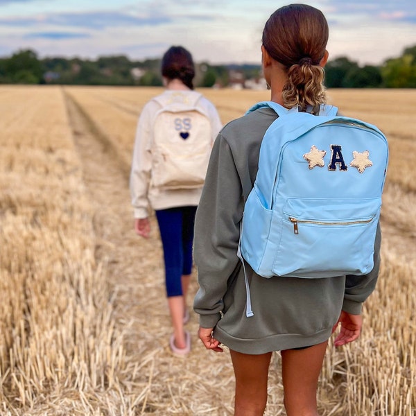 Sac à dos en nylon avec patchs en chenille scintillants cousus