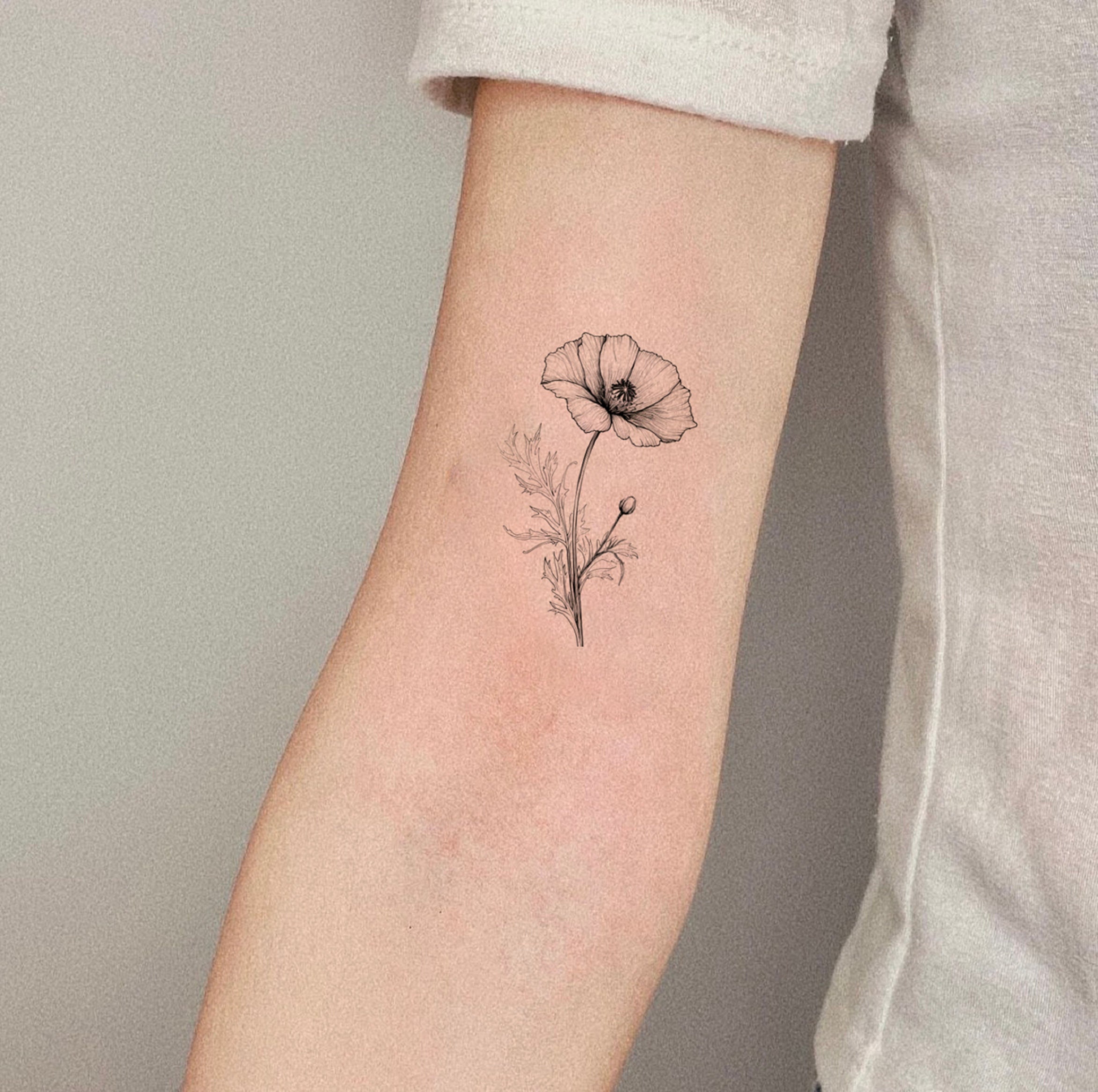 Lily of the Valley and Poppy Flower Tattoo | Poppy flower tattoo, Poppies  tattoo, Bouquet tattoo