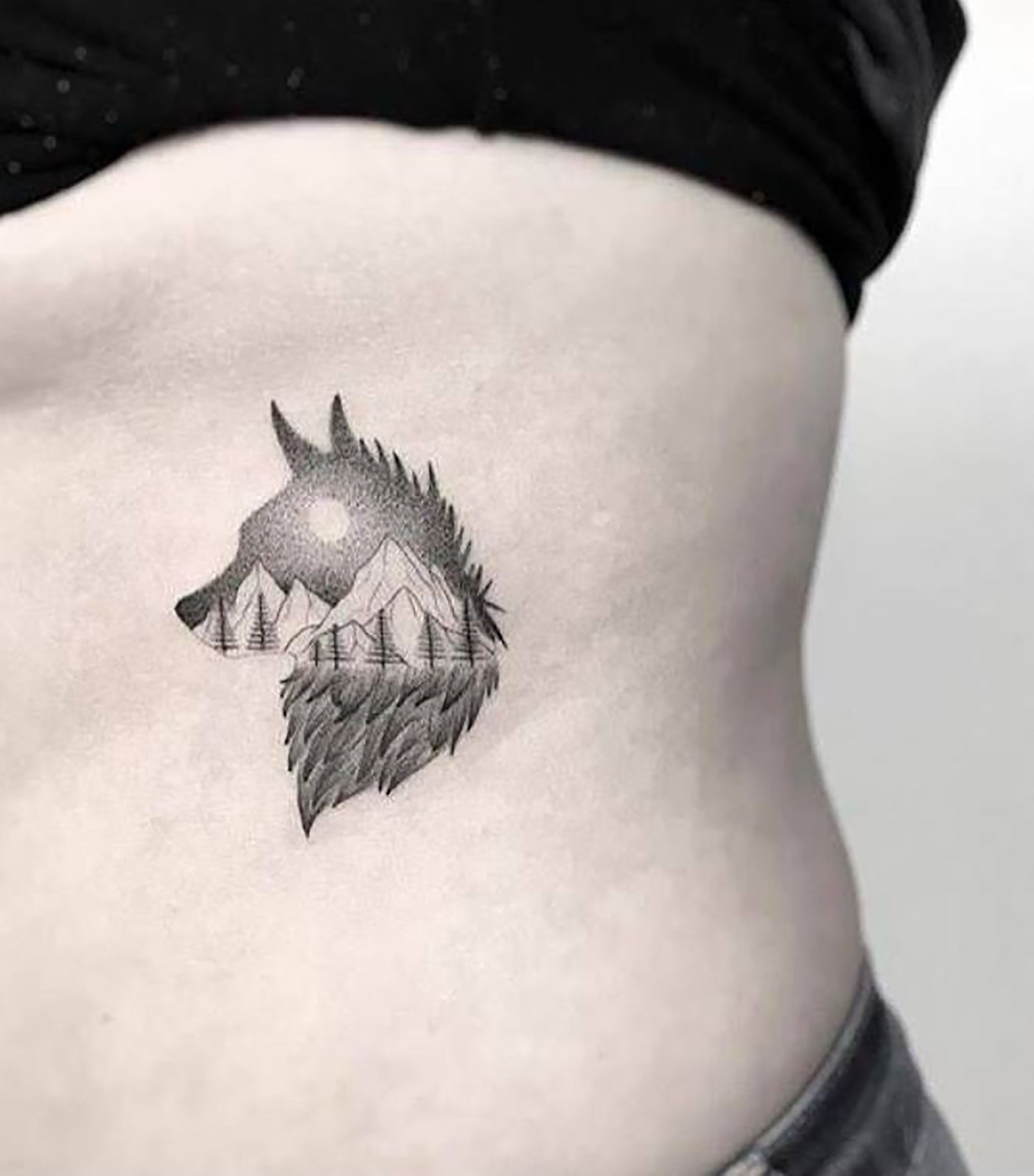 Wolf On Ribs Wolf Tattoo Ribs