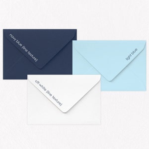 May include: Three envelopes in different colors: navy blue, off-white, and light blue. Each envelope has a subtle line texture and the color name printed on the flap.