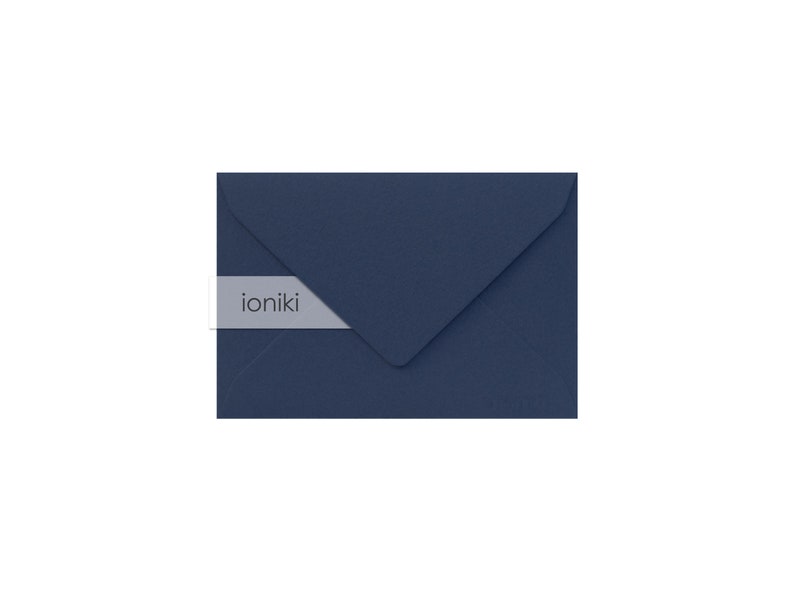 May include: A dark blue envelope with a white label that says "ioniki" on it.