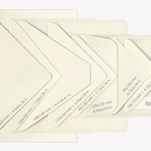 May include: A set of six ivory envelopes in various sizes, with measurements in inches and millimeters. The smallest envelope is 75x110 mm (2.95x4.33 in) and the largest is 160x220 mm (6.30x8.66 in). The envelopes are arranged in a staggered pattern, with the largest envelope at the bottom and the smallest envelope at the top. The word "ioniki" is printed on the smallest envelope.