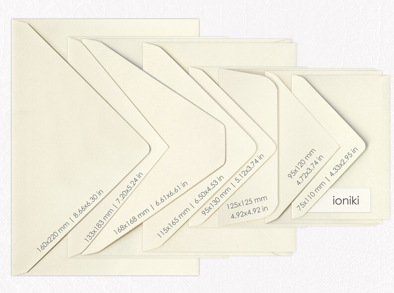 May include: A set of six ivory envelopes in various sizes, with measurements in inches and millimeters. The smallest envelope is 75x110 mm (2.95x4.33 in) and the largest is 160x220 mm (6.30x8.66 in). The envelopes are arranged in a staggered pattern, with the largest envelope at the bottom and the smallest envelope at the top. The word "ioniki" is printed on the smallest envelope.