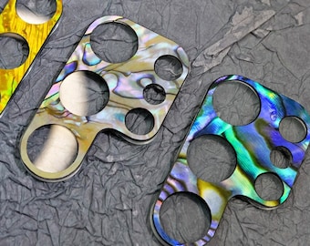Set di protezioni per lenti della fotocamera Shell per iPhone e Samsung