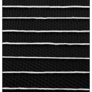 May include: Black and white striped fabric with a textured honeycomb pattern. The fabric has a series of white lines running horizontally across the black background.