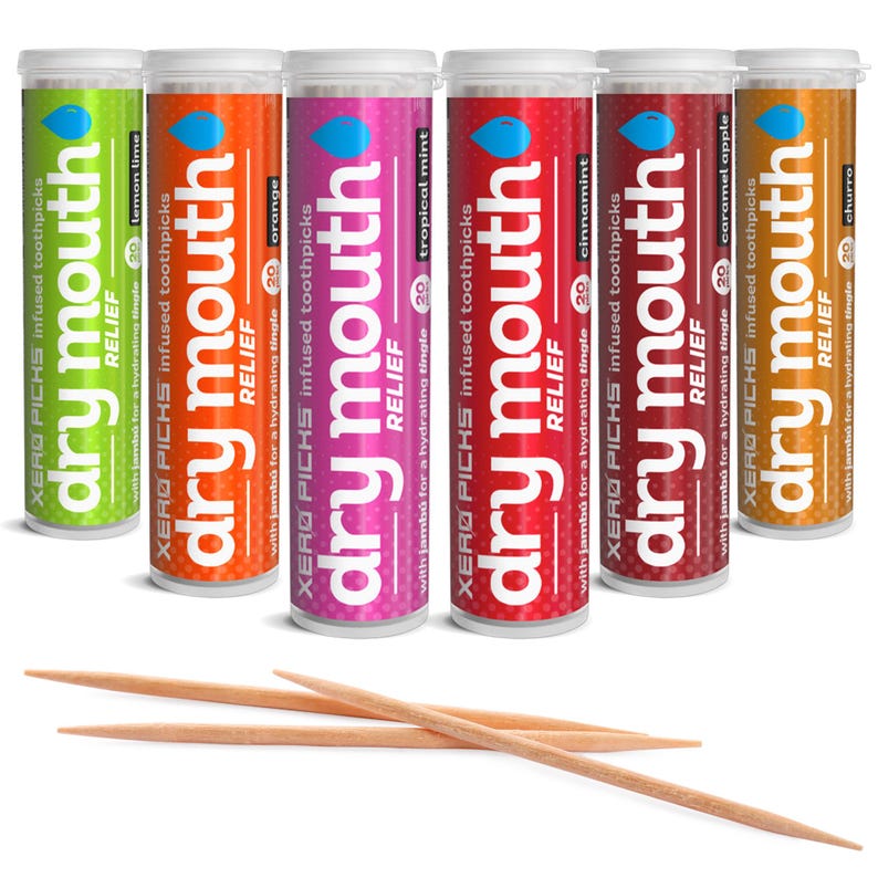 May include: Six cylindrical containers of "dry mouth" infused toothpicks in various flavors: lemon lime, orange, tropical mint, cinnamon, caramel apple, and churro. Each container has a different color and a blue droplet logo. Several wooden toothpicks are in front of the containers.