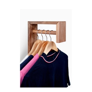 Wall coat hanger, t-shirt rack, wall organizer