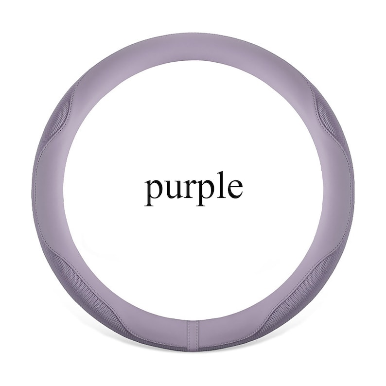 Peut inclure: Housse de volant en cuir de couleur violette avec un design textur&eacute;.