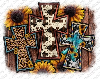 Könnte beinhalten: Drei Holzkreuze mit verschiedenen Mustern. Die Kreuze befinden sich auf einem Holzgrund mit Sonnenblumen drumherum. Die Muster umfassen Kuhfell, Leopardenmuster und ein blaues und weißes Muster.
