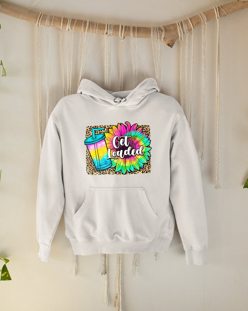 May include: White hoodie featuring a colourful tie-dye sunflower and a drink with a straw. The text "Get Loaded" is printed on the hoodie.