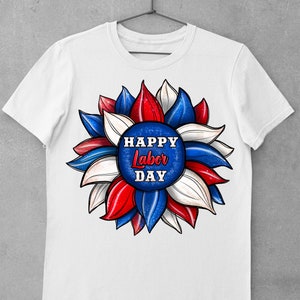 May include: White t-shirt with a red, white, and blue sunflower design. The sunflower has the words "Happy Labor Day" in the center.