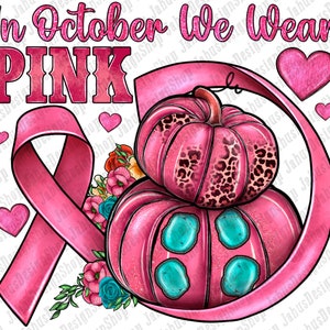May include: Pink ribbon with a stack of pink pumpkins with a leopard print design and turquoise accents. The text "In October We Wear PINK" is at the top of the image.