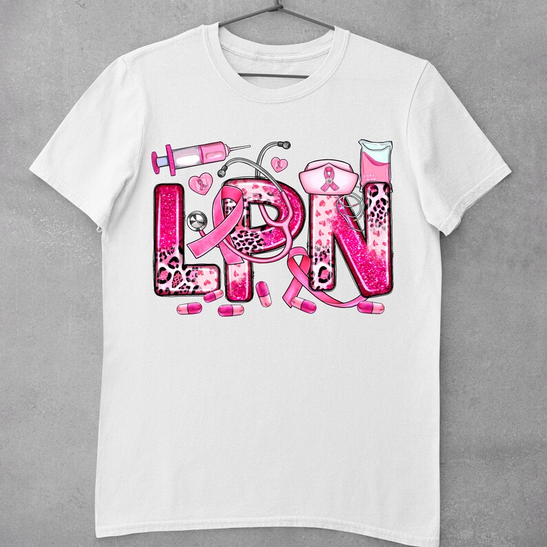 May include: White t-shirt with a pink glitter design that says "LPN" with pink medical symbols and a pink ribbon.