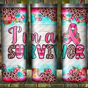 May include: Three stainless steel tumblers with a pink and blue floral design and a pink ribbon. The tumblers have the text "I'm a SURVIVOR" printed on them.