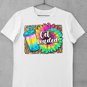 May include: White t-shirt featuring a graphic design of a tie-dye sunflower, a leopard print background, and a blue and yellow drink with the text "Get Loaded".