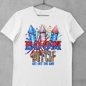 May include: White t-shirt with a red, white, and blue graphic of fireworks and the text "BOOM BITCH GET OUT THE WAY".