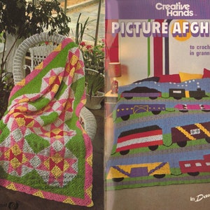 May include: Two crochet afghan patterns. The first pattern is a colorful patchwork design with pink, green, white, and yellow squares. The second pattern is a train design with blue, green, yellow, red, and black squares.