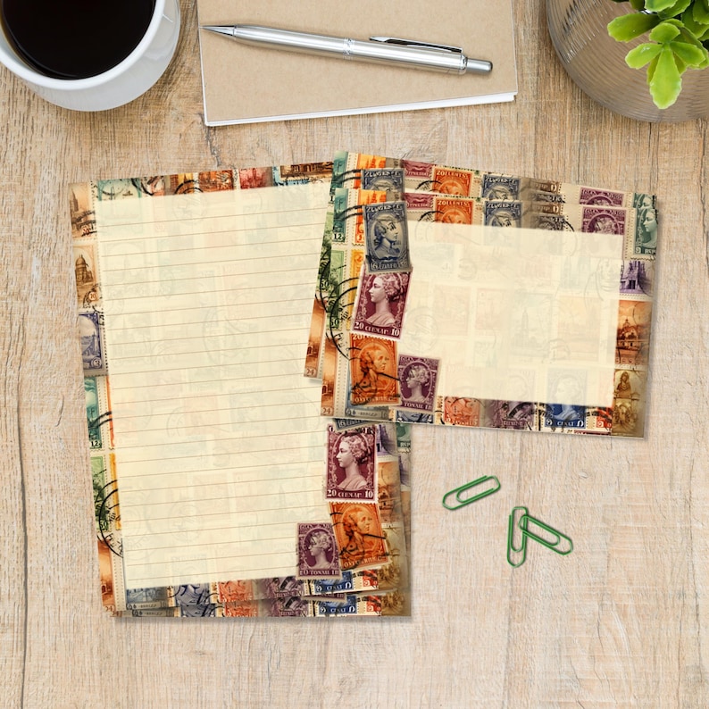 May include: Stationery set featuring lined paper and notecards with a vintage postage stamp border. The stamps showcase portraits and historical imagery in shades of orange, purple, and green. Includes two green paper clips.