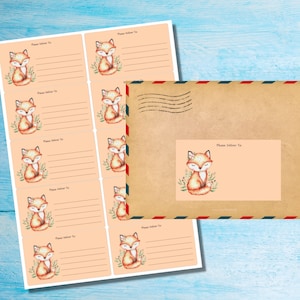 May include: A sheet of printable labels featuring a cute fox illustration. Each label has a line for writing "Please Deliver To:" and a space for an address. The labels are on a peach background.