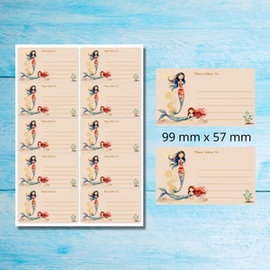 May include: Mermaid-themed address labels. The labels feature illustrations of mermaids with flowing hair and colorful tails. The text "Please Deliver To:" is printed at the top. The labels measure 99 mm x 57 mm.