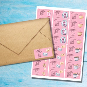 May include: A sheet of pink and white address labels with various illustrations of hearts, envelopes, and coffee cups. The labels are designed for a wedding or other special occasion. The text on the labels reads "Sarah Black, 17 Longwood Road, Your Town, Berkshire, BT1 7TT, England".