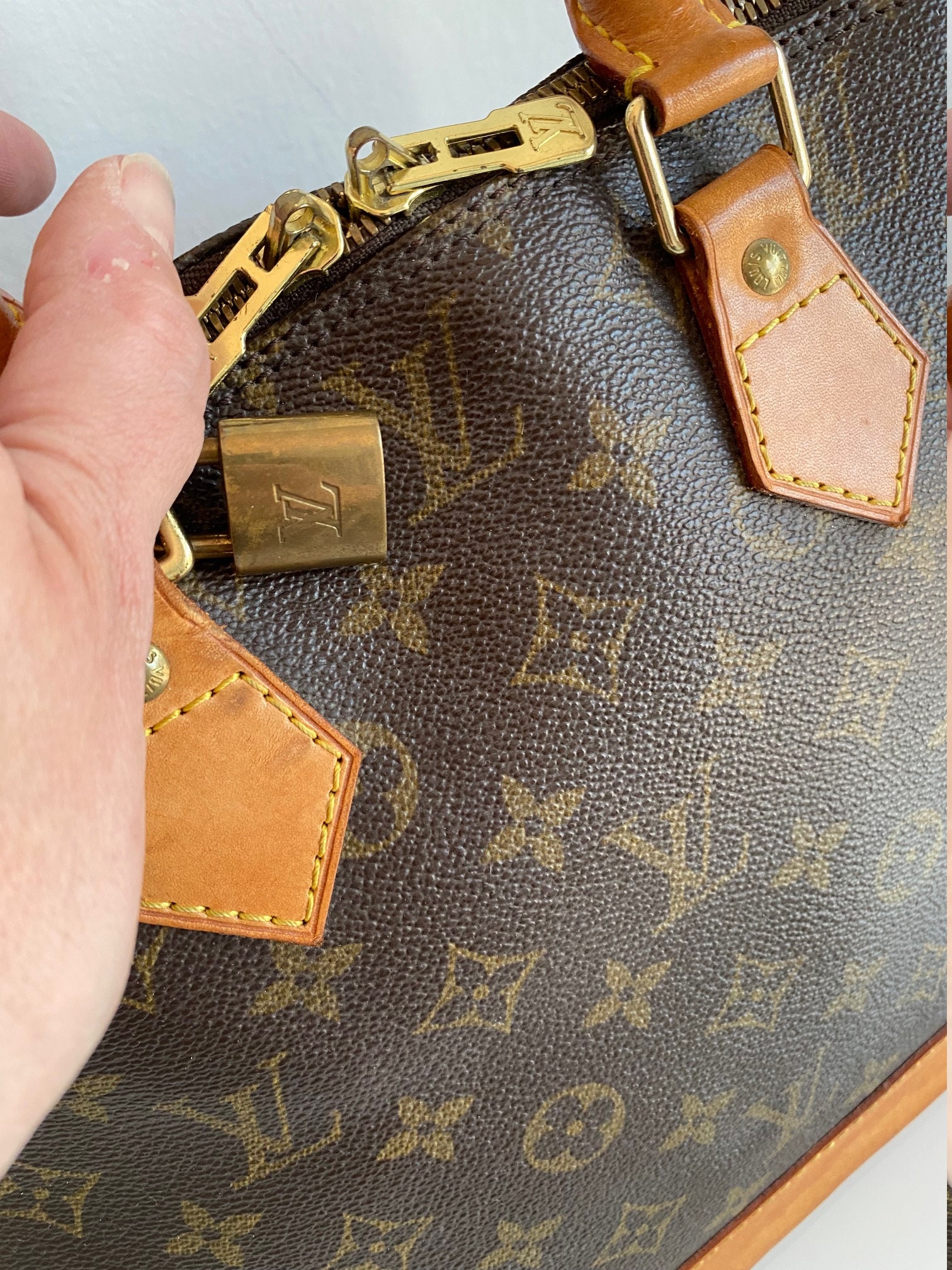 Authenticated Used Louis Vuitton Monogram Old Alma PM Handbag