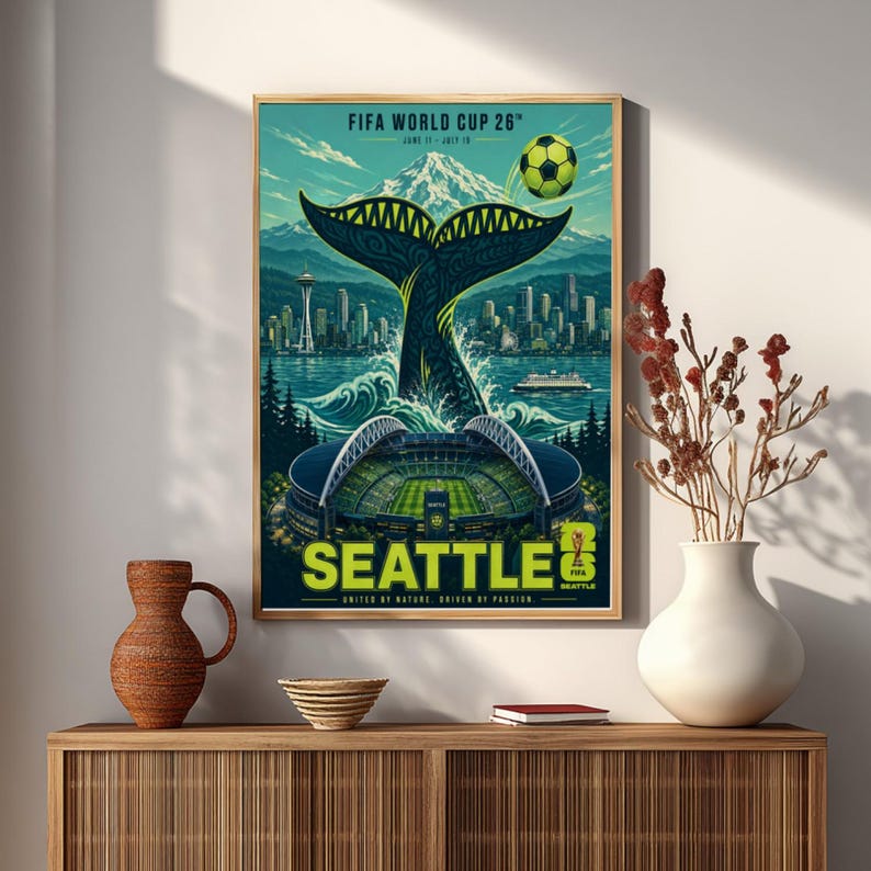 May include: A rectangular poster for FIFA World Cup 26 in Seattle featuring a whale tail, the Space Needle, a stadium, and a soccer ball. The text reads FIFA WORLD CUP 26, JUNE 11 - JULY 19, SEATTLE, UNITED BY NATURE, DRIVEN BY PASSION.