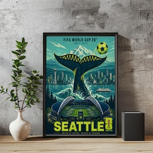 May include: A framed poster for the FIFA World Cup 26 in Seattle featuring a large whale tail rising from water, the Space Needle, a mountain, a soccer stadium, and a soccer ball. The text reads FIFA WORLD CUP 26, SEATTLE, and UNITED BY NATURE.
