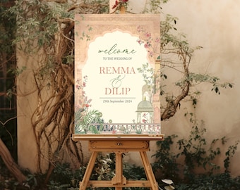 Puede incluir: Un caballete de madera exhibe un letrero de bienvenida de boda. El letrero presenta un diseño de arco ornamentado con ilustraciones florales y arquitectónicas. El texto dice "welcome to the wedding of Remma & Dilip, 29th September 2024."