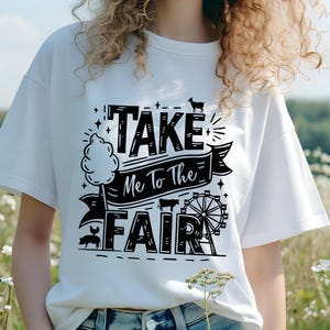 May include: White t-shirt with black text that reads "Take Me To The Fair" with a graphic of a Ferris wheel, a pig, and a cotton candy stand.