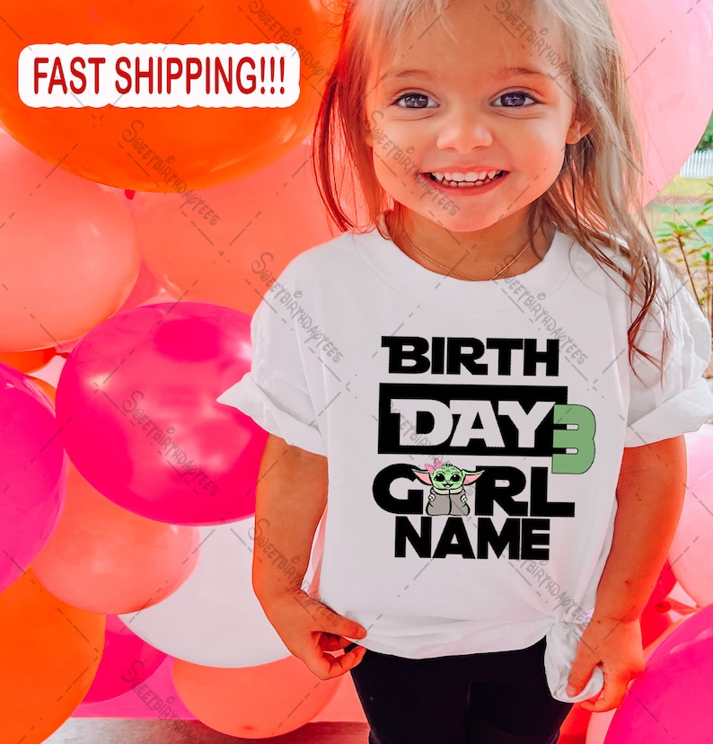 May include: White t-shirt with a black and green graphic of a character from the Star Wars franchise. The text "BIRTH DAY 3 GIRL NAME" is printed on the shirt.