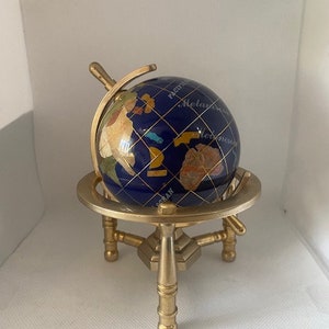 Hand made globe made of Lapis Lazuli and other semi precious stones with Gold Plated Brass tripod Stand 14 cm height and 8cm diameter. image 3