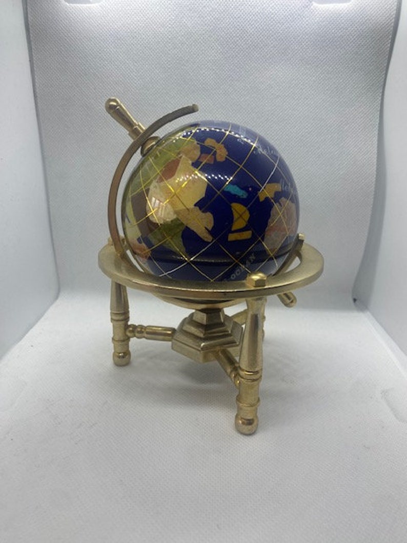 Hand made globe made of Lapis Lazuli and other semi precious stones with Gold Plated Brass tripod Stand 14 cm height and 8cm diameter. image 6