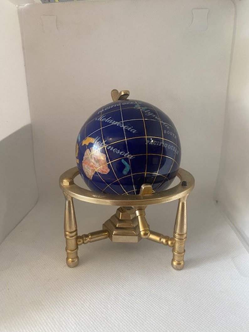 Hand made globe made of Lapis Lazuli and other semi precious stones with Gold Plated Brass tripod Stand 14 cm height and 8cm diameter. image 2