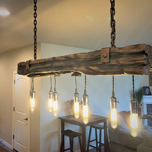 Rustic industrial reclaimed distressed beam light fixture, chandelier w/ (8) twisted cord outlets.