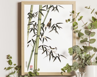 May include: A framed print of a watercolor painting depicting two birds perched on bamboo stalks. The birds are painted in shades of brown and white, while the bamboo stalks are green. The background is white.