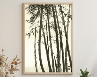 Puede incluir: Una impresión en blanco y negro enmarcada de un bosque de bambú. La impresión está sobre un fondo crema y los tallos de bambú se representan en un estilo minimalista.